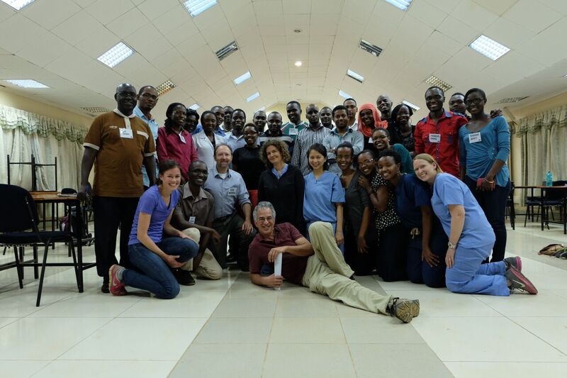 Moi University collaborators and partners sit for a photo