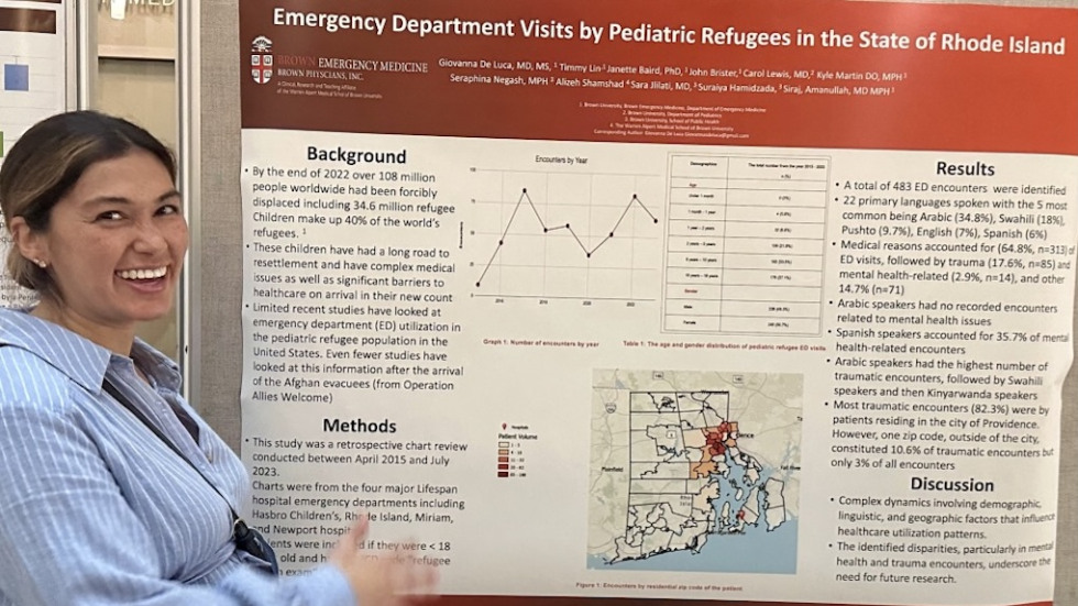 Dr. Deluca presenting research poster
