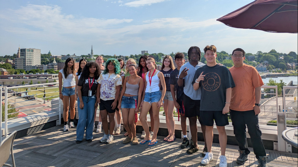 pre-college students on med school patio